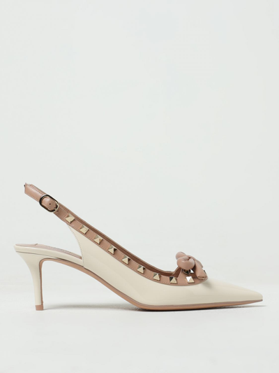 Shop Valentino Rockstud Slingback In Patent Leather With Studs In Yellow Cream