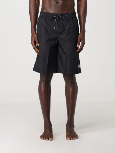 Shop Dolce & Gabbana Swimsuit  Men Color Black