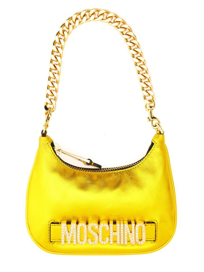 Shop Moschino Logo Plaque Zip In Yellow