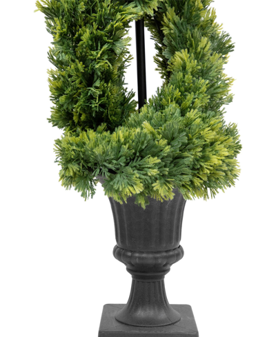 Shop Northlight 4.5' Artificial Cedar Double Spiral Topiary Tree In Urn Style Pot Unlit In Green