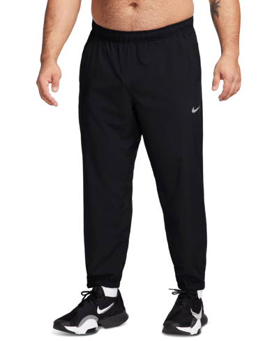 Shop Nike Men's Form Dri-fit Standard-fit Tapered-leg Training Pants In Black,black,(reflective Silv)