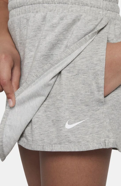 Shop Nike Kids' Dri-fit Breezy Mid Rise Skort In Dark Grey Heather/ White