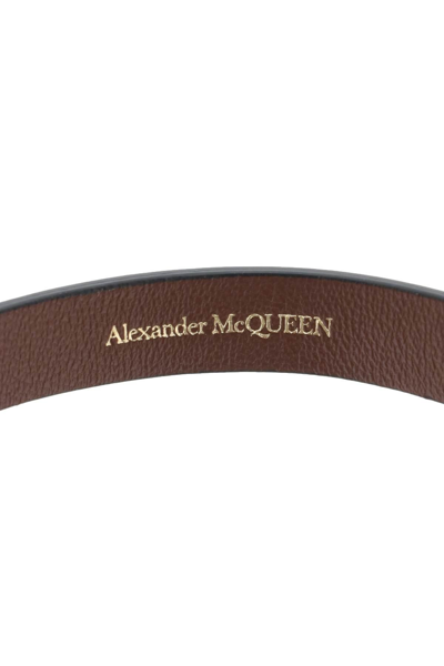 Shop Alexander Mcqueen Seal Bracelet In Black,gold