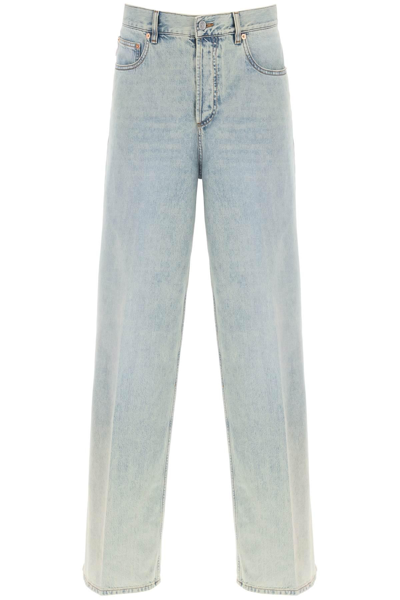 Shop Valentino Oversized Jeans With V Detail In Blue