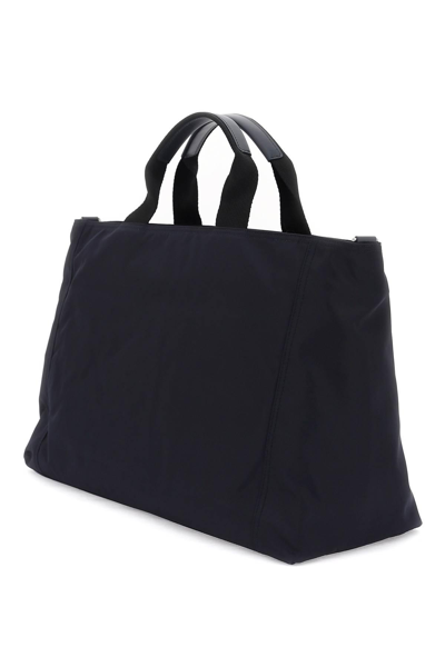 Shop Dolce & Gabbana Rubberized Logo Nylon Duffle Bag In Blue