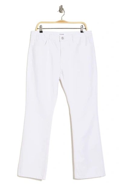 Shop Frame The Low Bootcut Jeans In Blanc