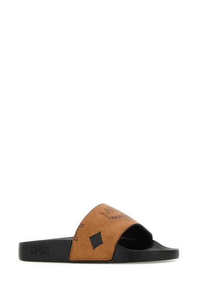 Shop Mcm Slippers In Camel