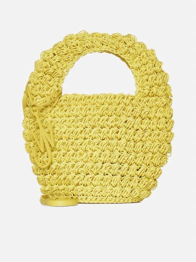 Shop Jw Anderson Raffia Small Popcorn Basket Bag In Yellow