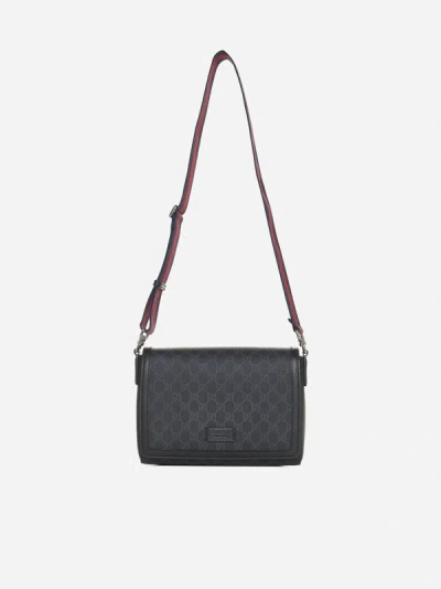 Shop Gucci Gg Canvas Crossbody Bag In Black