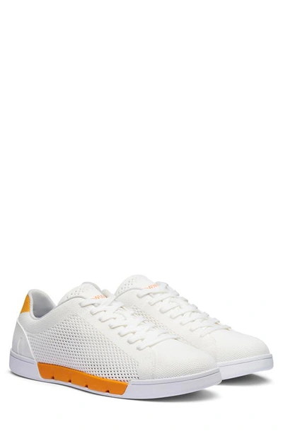 Shop Swims Breeze Tennis Washable Knit Sneaker In White/ Saffron