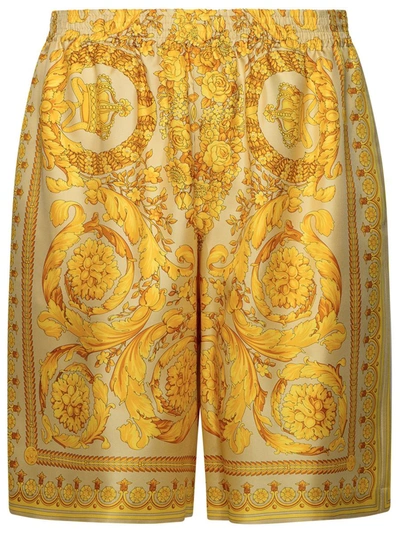 Shop Versace 'baroque' Gold Silk Bermuda Shorts