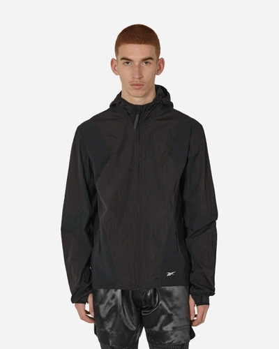 Shop Reebok Paneled Running Jacket In Black