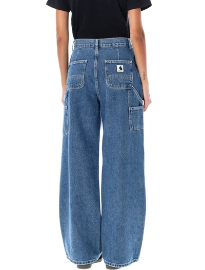 Shop Carhartt Wip Wide Denim Jeans In Blue Heavy Stone Washed