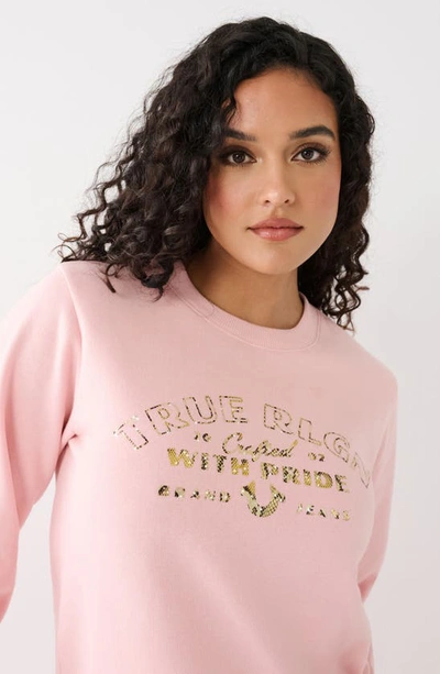 Shop True Religion Brand Jeans Snakeskin Foil Logo Crop Pullover Sweatshirt In Strawberry Cream