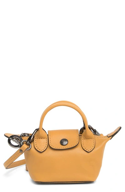 Shop Longchamp Le Pliage Cuir Nano Crossbody Bag In Honey