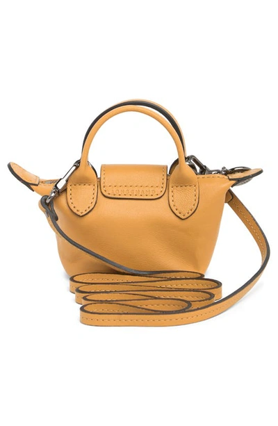 Shop Longchamp Le Pliage Cuir Nano Crossbody Bag In Honey