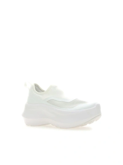 Shop Comme Des Garçons Sneakers In White