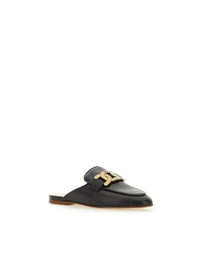 Shop Tod's Mules In Nero