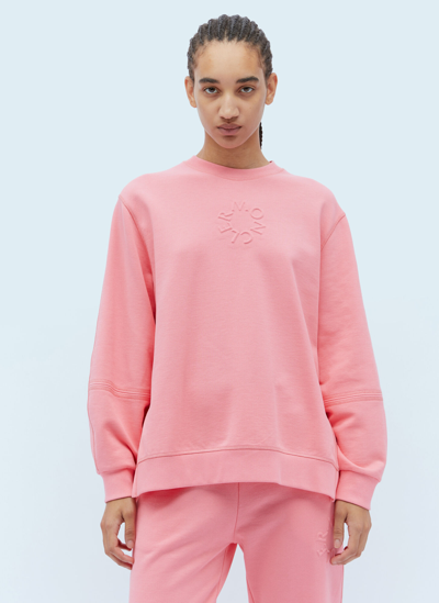 Shop Moncler Embossed Logo Sweatshirt In Pink