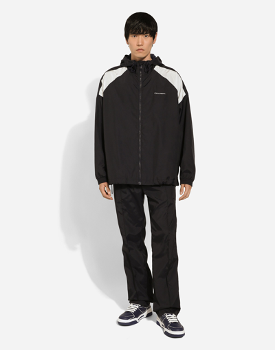 Dolce & Gabbana Technical Fabric Jacket With Logo Print In Blue
