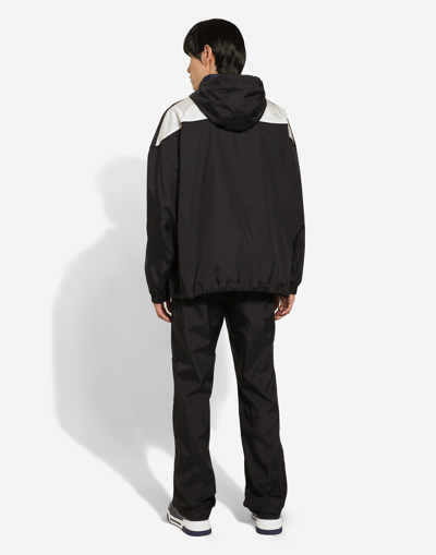 Dolce & Gabbana Technical Fabric Jacket With Logo Print In Blue
