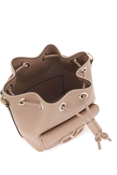 Shop Valentino Garavani Leather Locò Bucket Bag