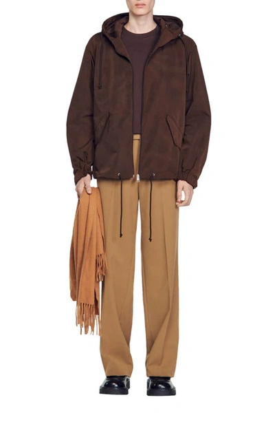 Shop Sandro Windy Hooded Windbreaker Jacket In Black Brown