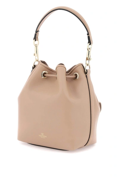 Shop Valentino Garavani Leather Locò Bucket Bag