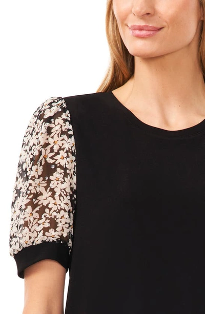 Shop Cece Daisy Puff Sleeve Mix Media Top In Rich Black