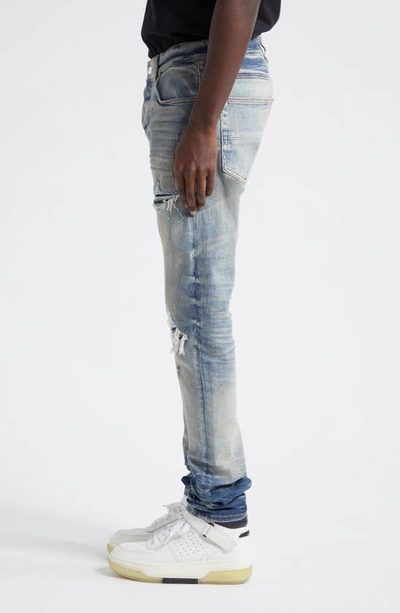 Shop Amiri Mx1 Dragon Lunar New Year Ripped & Patched Jeans In Vintage Indigo
