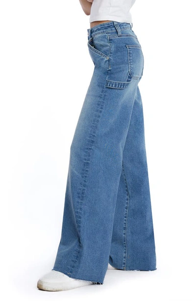 Shop Hint Of Blu Raw Hem Wide Leg Carpenter Jeans In Palma Blue