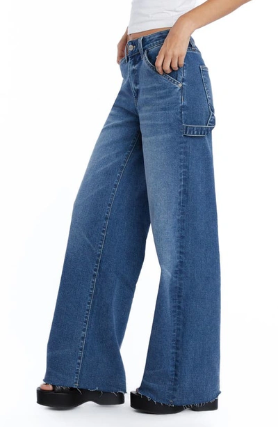 Shop Hint Of Blu Raw Hem Wide Leg Carpenter Jeans In Valencia Blue