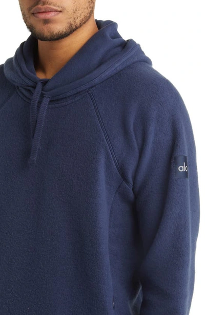 Shop Alo Yoga The Triumph Hoodie In Navy