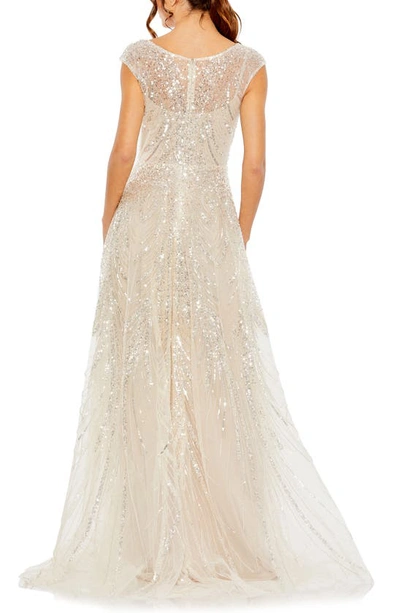 Shop Mac Duggal Illusion Neck Cap Sleeve Gown In Beige Silver