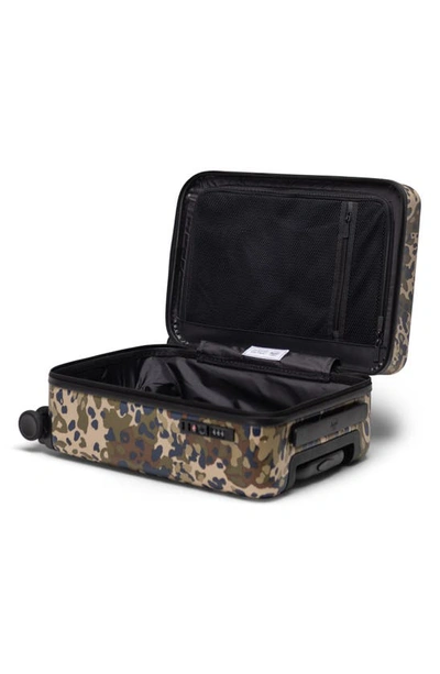 Shop Herschel Supply Co Heritage™ Hardshell Large Carry-on Luggage In Terrain Camo