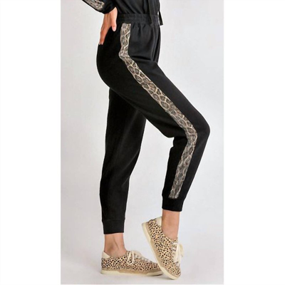Shop Umgee Be Wild Joggers With Leopard Sequin Stripe In Black