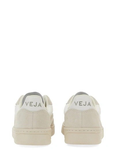 Shop Veja Sneakers V-10 Unisex In White