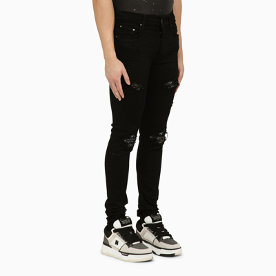 Shop Amiri Black Skinny Jeans With Camouflage Patches