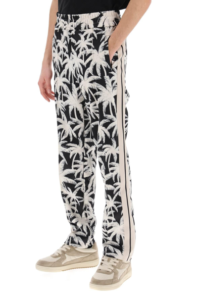 Shop Palm Angels Joggers With Palms Print