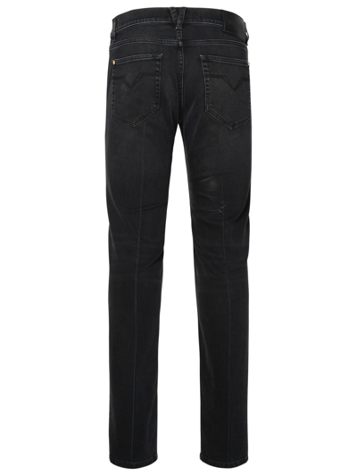 Shop Versace Black Cotton Jeans Man