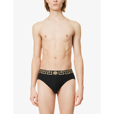 Shop Versace Logo-waistband Pack Of Two Stretch-cotton Briefs In Black Gold Greek Key