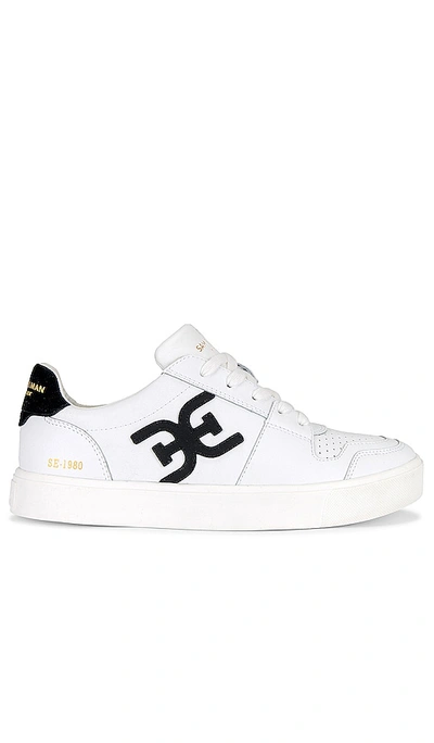 Shop Sam Edelman Ellie Sneaker In White & Black