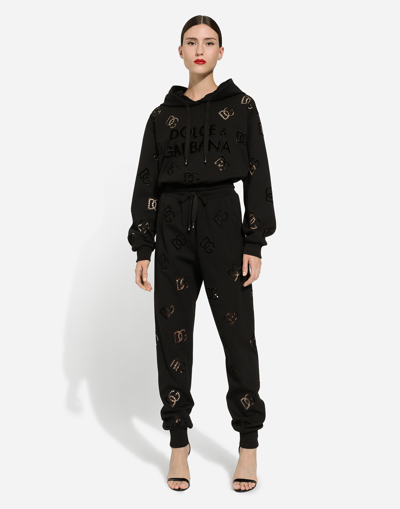 Shop Dolce & Gabbana Jersey Jogging Pants With Cut-out And Dg Logo In Black