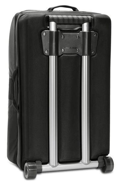 Shop Timbuk2 Copilot Wheeled Carry-on Suitcase In Glitch 2