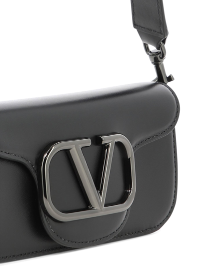 Shop Valentino Garavani Mini Locò Crossbody Bag