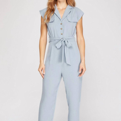 Shop She + Sky Dolman Sleeve Flap Pocket Belted Jumpsuit In Blue