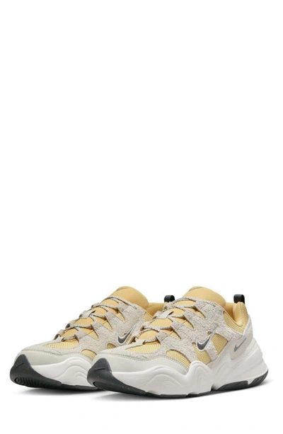 Shop Nike Tech Hera Sneaker In Saturn Gold/ Iron Grey/ Bone