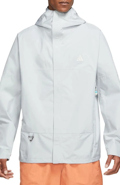 Shop Nike Acg Storm-fit Cascade Rains Packable Rain Jacket In Photon Dust/ Summit White