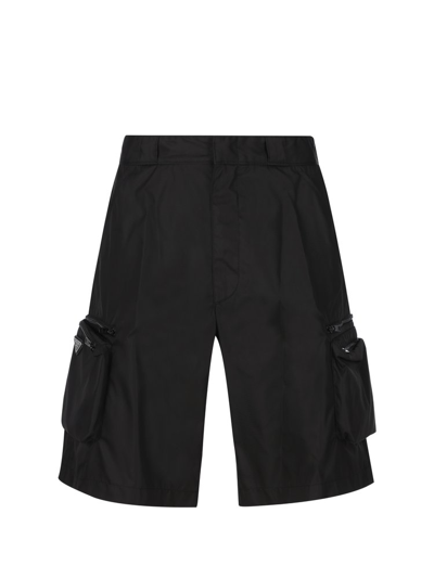 Shop Prada Logo Plaque Zipped Shorts In Black
