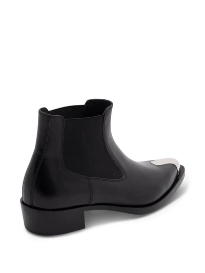 Shop Alexander Mcqueen Leather Ankle Boots In Black